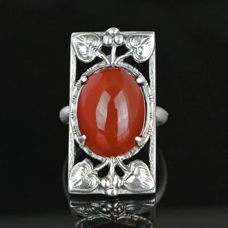 modern wedding bands with sleek finishes -Berry and Leaf Arts & Crafts Silver Cabochon Carnelian Ring